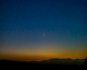 Fototapeta premium Amazing sunrise with moon and Venus 