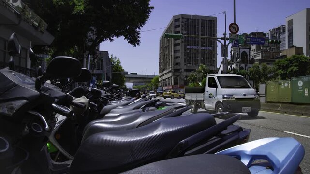 A timelapse of traffic jam near the scooter parking at Linsen N Rd in Taipei
