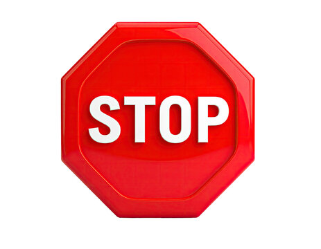 Red octagonal sign with bold white letters reading "STOP" against black background