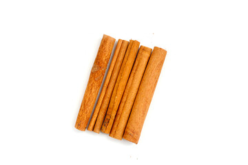 Dried cinnamon sticks arranged in a bundle.