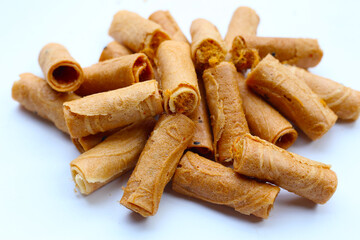 Rolled crispy wafers filled with shredded pork floss, Thai snack.
