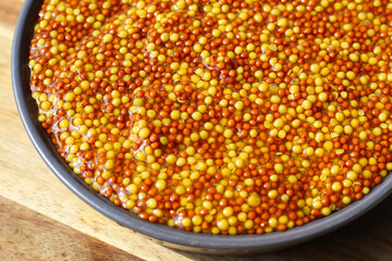 Wholegrain mustard seeds in brine