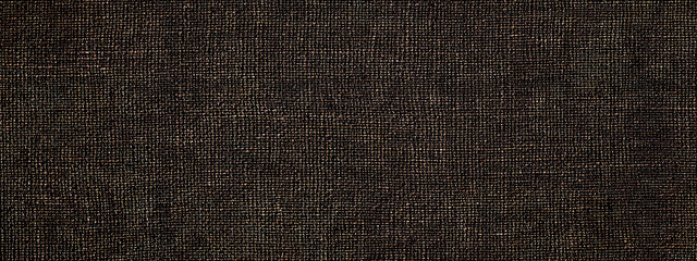 Textured dark fabric background suitable for various design projects and crafts