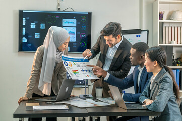 Manager Motivational teamwork officer by present document to colleagues decide. multiethnic coworker coach explain Analysis Statistics Report drawing presentation to business improvement teamwork