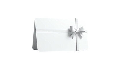 A white rectangular card with a satin ribbon and bow tied around it, on a black background