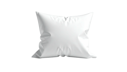 A single, puffy white pillow against a stark, black background with soft shadows