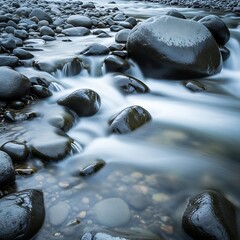 Flowing Water Over Rocks - A Serene Landscape.