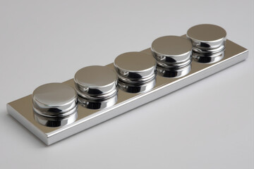 Metallic tokens transition from a cluttered desk to a clean runway symbolizing clarity