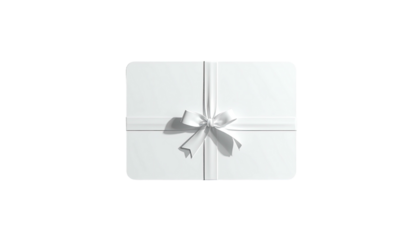 A top-down view of a white gift box tied with a matching ribbon