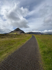 Empty walkway into the mountain.