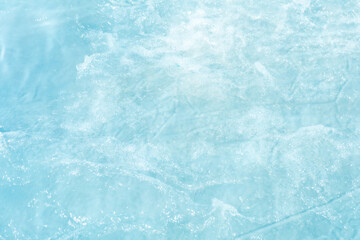 Blue water with ripples on the surface. Defocus blurred transparent blue colored clear calm water...