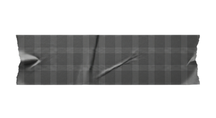 Close up view of a single piece of patterned tape with wrinkles and torn edges against a void space on transparent background