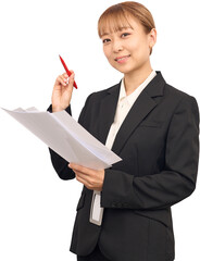 赤ペンを持ってるスーツを着た女性