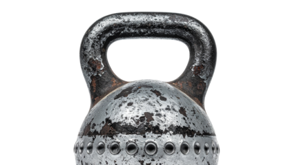 Worn, heavy metal kettlebell close-up