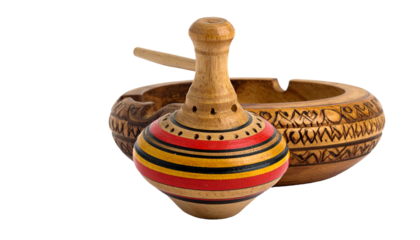 Ornate wooden bowl and spinning top