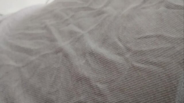 The background of the lush white shirt has not been ironed yet.