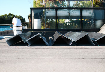 New roof metal flashing or metal coping before installation. Custom sheet metal fabrication to...