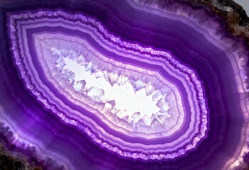 Symmetrical Agate Geode Purple agate slice with a bright, spiky crystalline core.