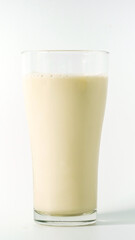 Soy milk in a glass on white background. Healthy drink with vitamins and nutrients. Milk Breakfast isolated. Healthy nutritious food healthcare feeling refreshed. Beverage benefits protein soybeans 