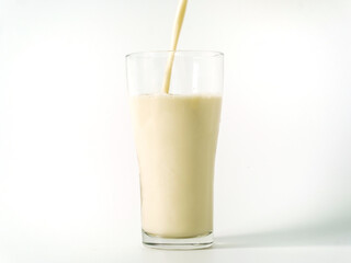 Soy milk in a glass on white background. Healthy drink with vitamins and nutrients. Milk Breakfast isolated. Healthy nutritious food healthcare feeling refreshed. Beverage benefits protein soybeans 