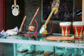 Traditional musical instruments displayed in a showcase