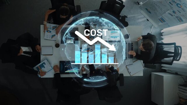 A dynamic business meeting showcasing professionals analyzing global financial trends and cost reduction strategies using charts and data insights at a conference table. Raster