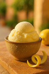 Lemon Sorbet in Rustic Bowl with Lemon Peel and Natural Light