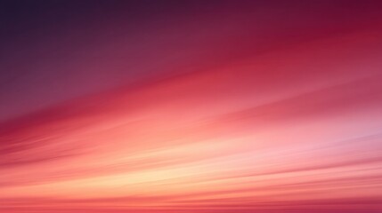 A mesmerizing gradient of pink and purple hues fills the sky, creating a serene and calming atmosphere.