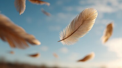 Delicate feathers float gracefully through a clear blue sky, creating a serene and tranquil atmosphere.