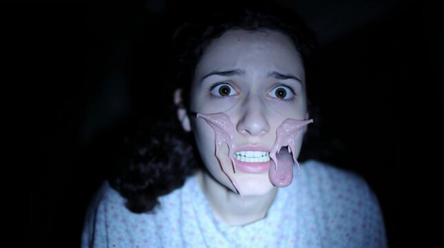 Video screamer. Short, 5 seconds, screamer about sudden paranormal action happened to young girl in a dark cellar