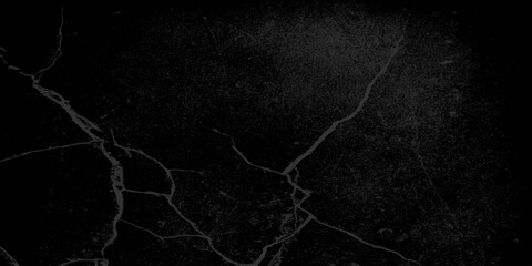 Old black toned grunge rough scratched textured wall, Empty surface of Black stone or grunge charcoal black board or chalk board texture, grainy Marble Black Texture Background.