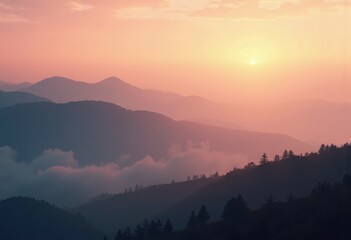 Obraz premium Majestic Hills Wrapped in Ethereal Fog at Sunrise with Glowing Hues in the Sky