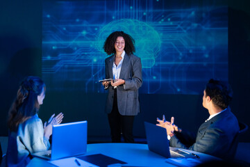 Successful businesswoman receiving applause from the audience after an inspiring presentation on...