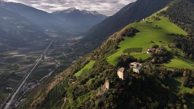Juval castle, medieval castle 1000 meters above sea level over looking valley in South Tyrol, Italy. Aerial video.
