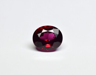 High-resolution photo of red ruby gemstone isolated on white background