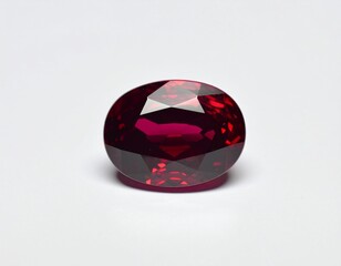 High-resolution photo of red ruby gemstone isolated on white background