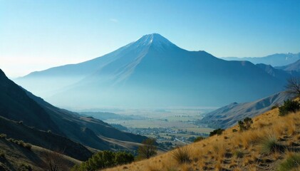Fototapeta premium Misty Utah Valley with Towering Mountains A tranquil, atmospheric photograph capturing a serene Utah valley gently veiled in soft morning mist. Towering, verdant mountains rise majestically in the