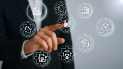 Businessman manages real estate investment development with modern innovative digital technology.