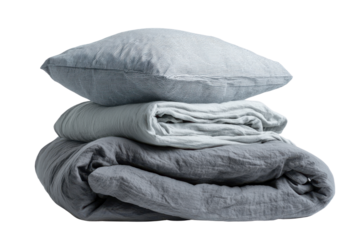 Stack of folded grey and blue striped bedding with pillow on black background duvet, Isolated On Transparent Background, Png Cut Out