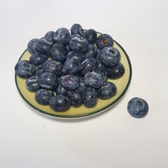 Plate of fresh blueberries