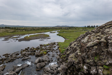 rock formations and grass field in Iceland