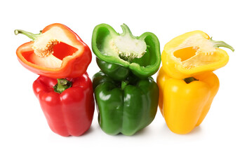Ripe colorful bell peppers on white background