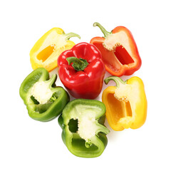 Cut colorful bell peppers on white background