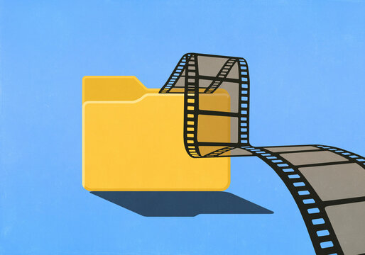 Film negative falling out of digital folder on blue background

