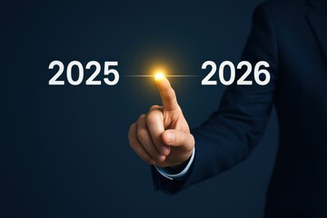 Businessman Transitioning from 2025 to 2026 with Bright Light Symbolizing Change and Future Opportunities