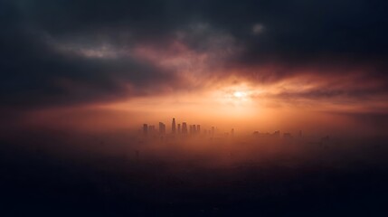 Muted sunrise pierces thick smog casting orange glow over city skyline