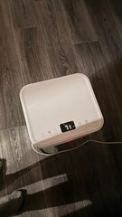 A device for dehumidifying an apartment from humidity and dampness. View from above. High critical...