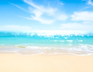 Fototapeta premium Blurred beach scene with golden sand, shimmering turquoise water, and bright blue sky