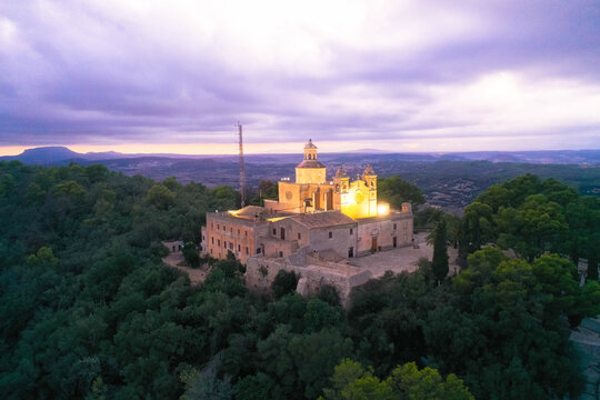 Aerial view at dusk. The Ermita de Bonany monastery is located on a 315-meter-high mountain between Petra, Villafranca de Bonany, and Sant Joan. Mallorca, Europe
