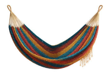 A handwoven Mexican hammock perfect for a tropical backyard setting.